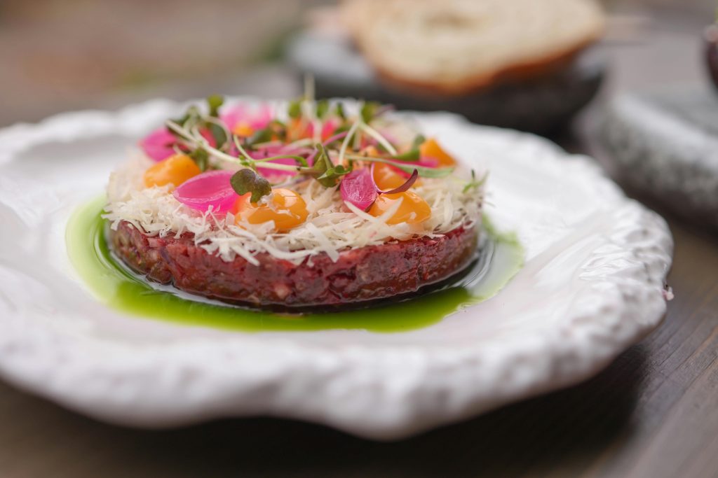 pexels-photo-29653131-29653131 Delicious gourmet tartare elegantly presented on a white plate with vibrant garnishes.